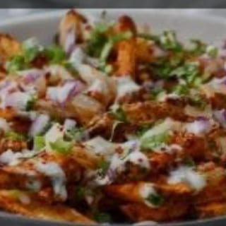 Philly Masala cheesy fries